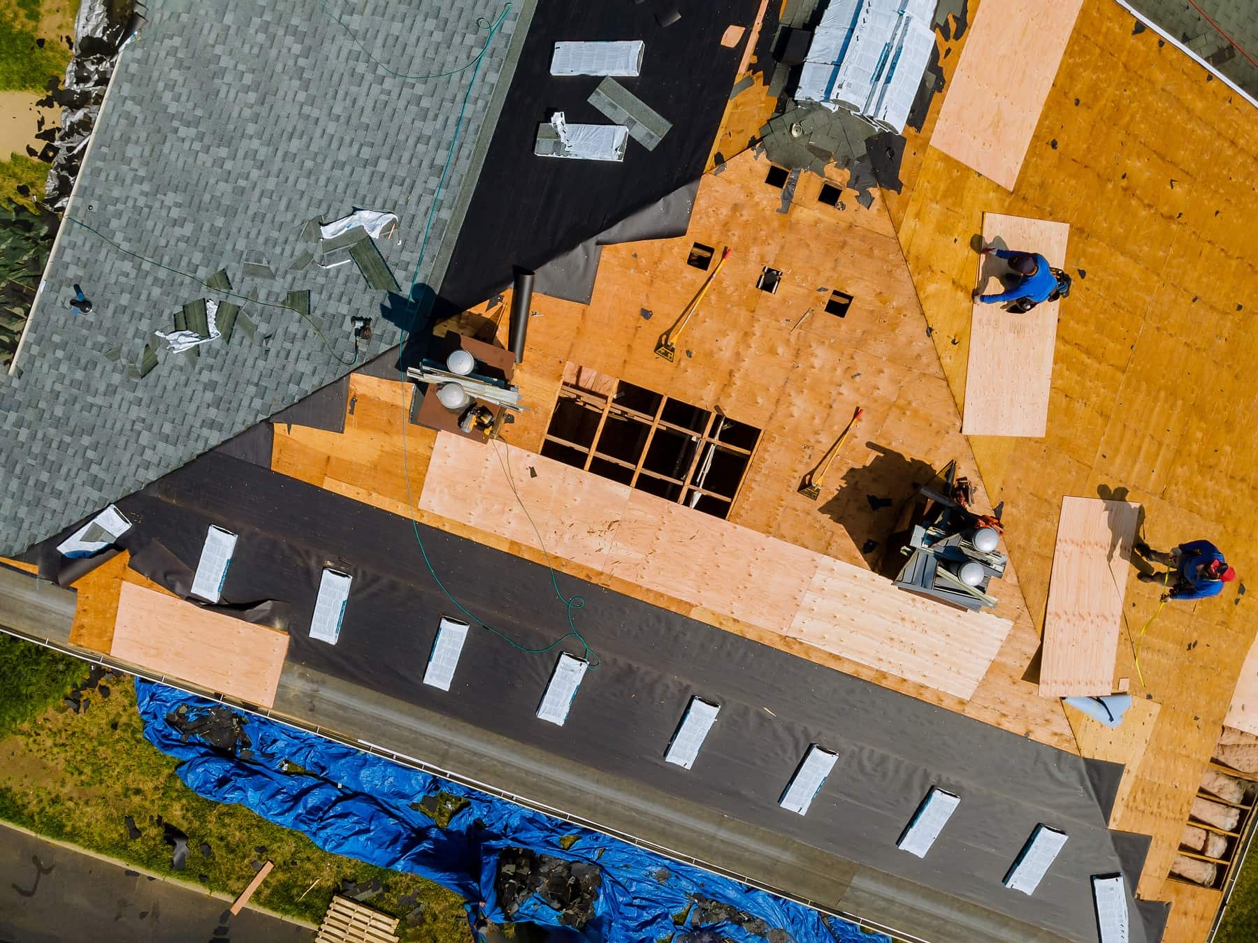 a-roofer-nailing-shingles-with-air-gun-replacing-2026-03-25-00-20-59